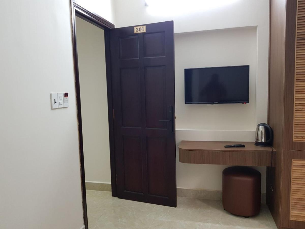 Hong Vinh Hotel โฮจิมินห์ซิตี้ ภายนอก รูปภาพ