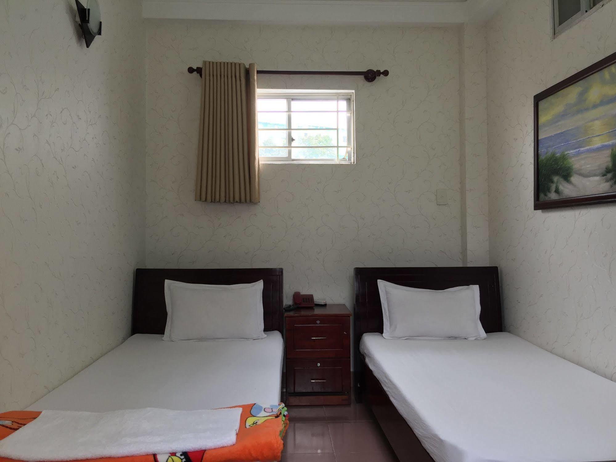 Hong Vinh Hotel โฮจิมินห์ซิตี้ ภายนอก รูปภาพ